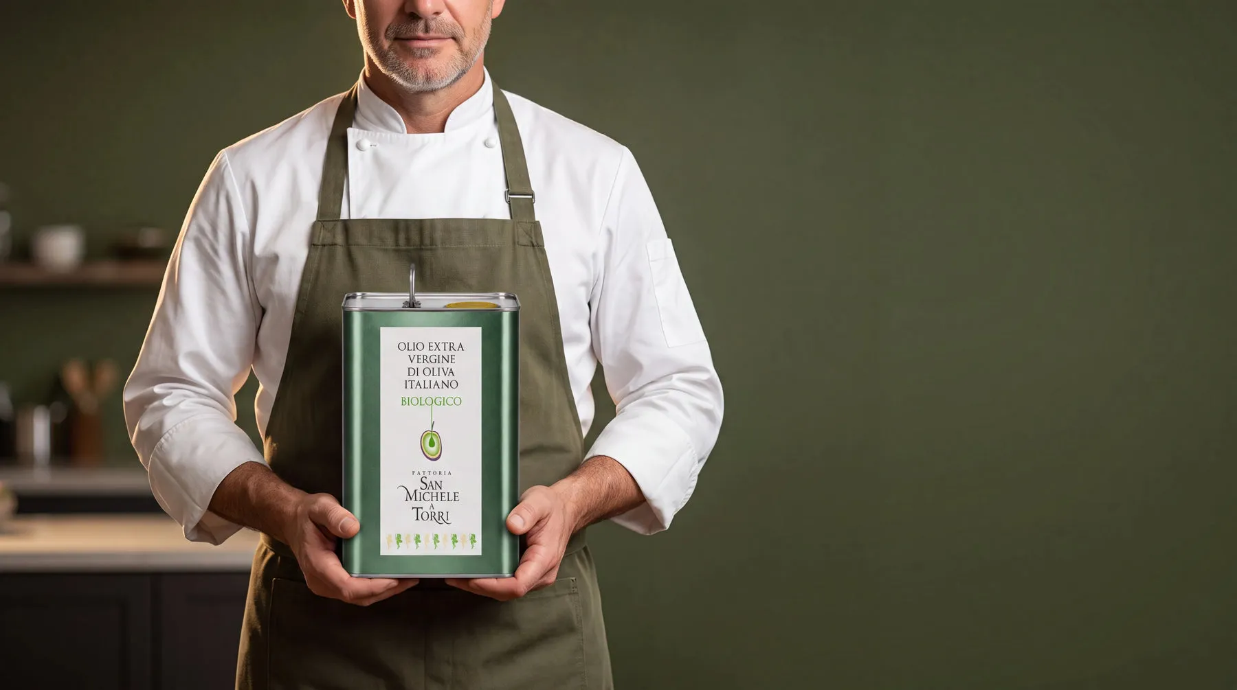 Chef holding a can of organic extra virgin olive oil